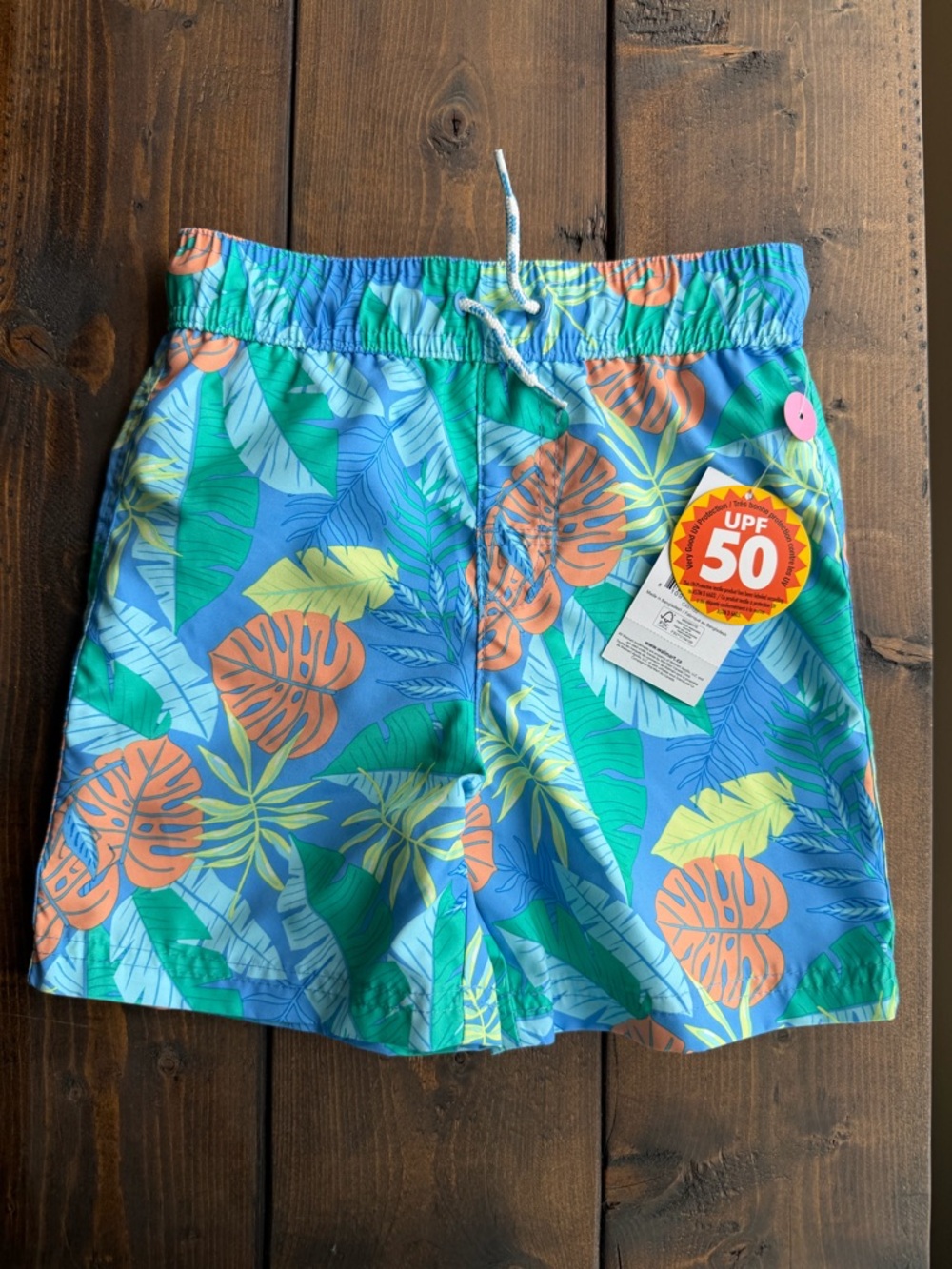 George Blue Tropical Leaf Swim Trunks with Orange Accents